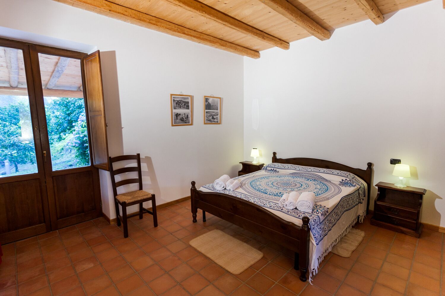 Farmhouse with pool between oranges and lemons trees