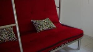 A bunk bed with a red mattress and a metal frame. - Apartment/ flat - Pieve (Piève)