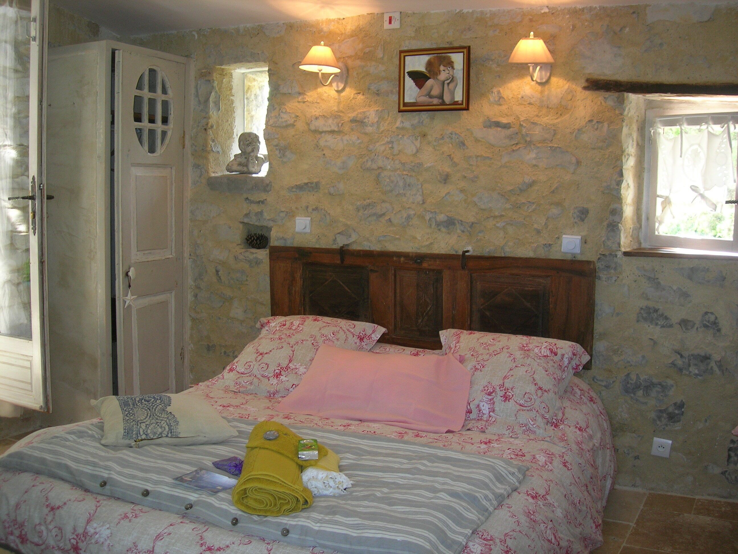 semi-detached cottage in private property with trees 