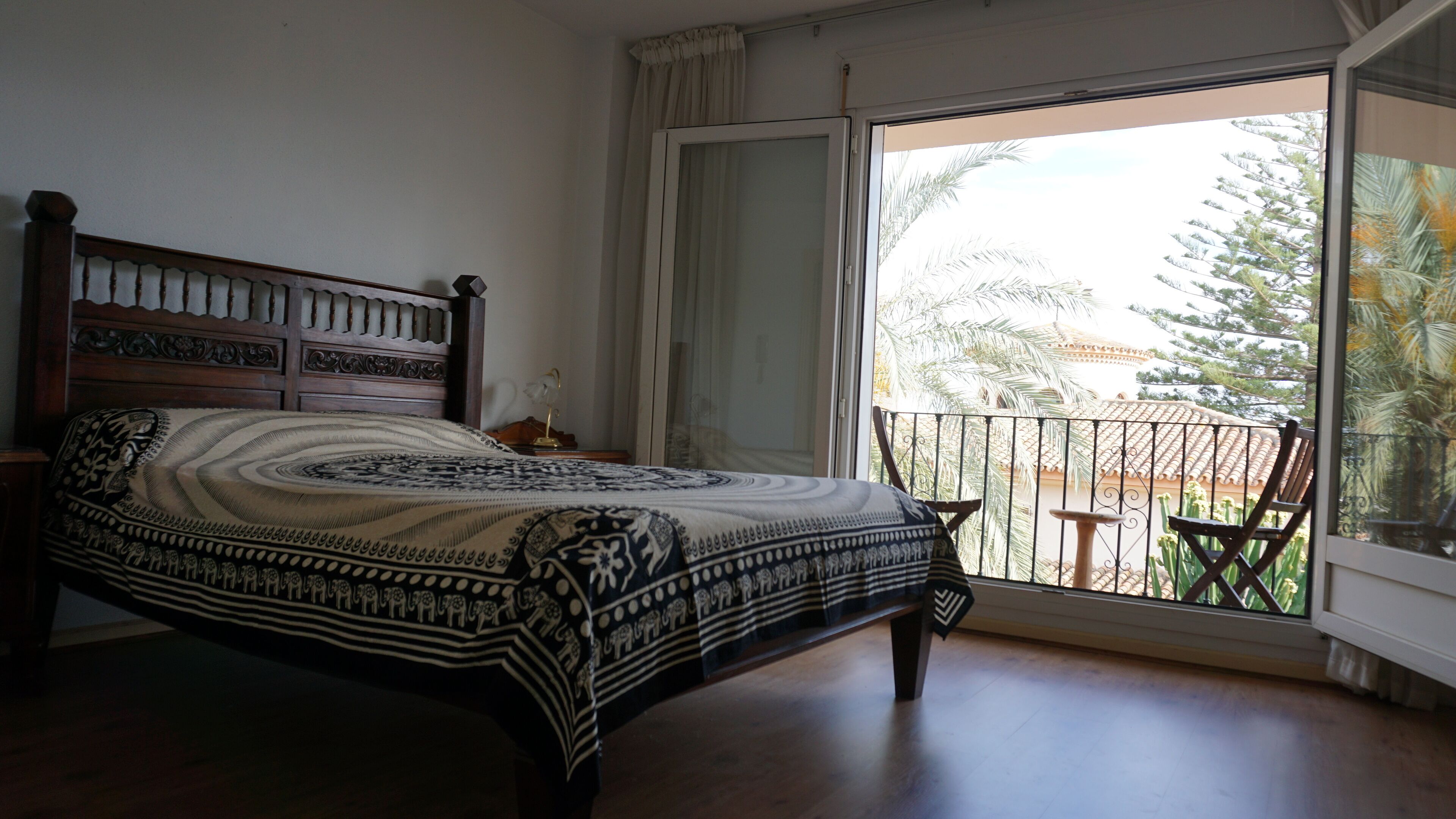 The ensuite bedroom and balcony.