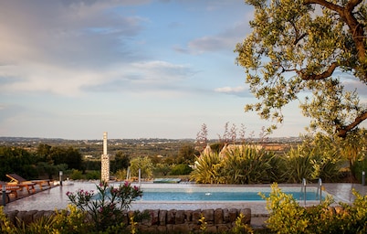 Trulli Bianchi. Characteristic stone trullo with private pool and panoramic view
