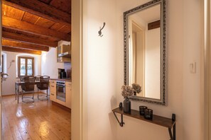 Fridge, microwave, oven, stovetop - under a historical exposed wooden beam ceiling, monument protection (Görlitz)
