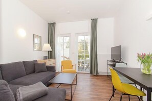 TV, DVD player, video library, stereo