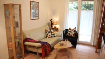 TV, livros, aparelho de som