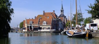 Gezellige "Schwedenhaus" met prachtig uitzicht, gelegen aan het water 