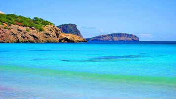 On the beach, sun loungers