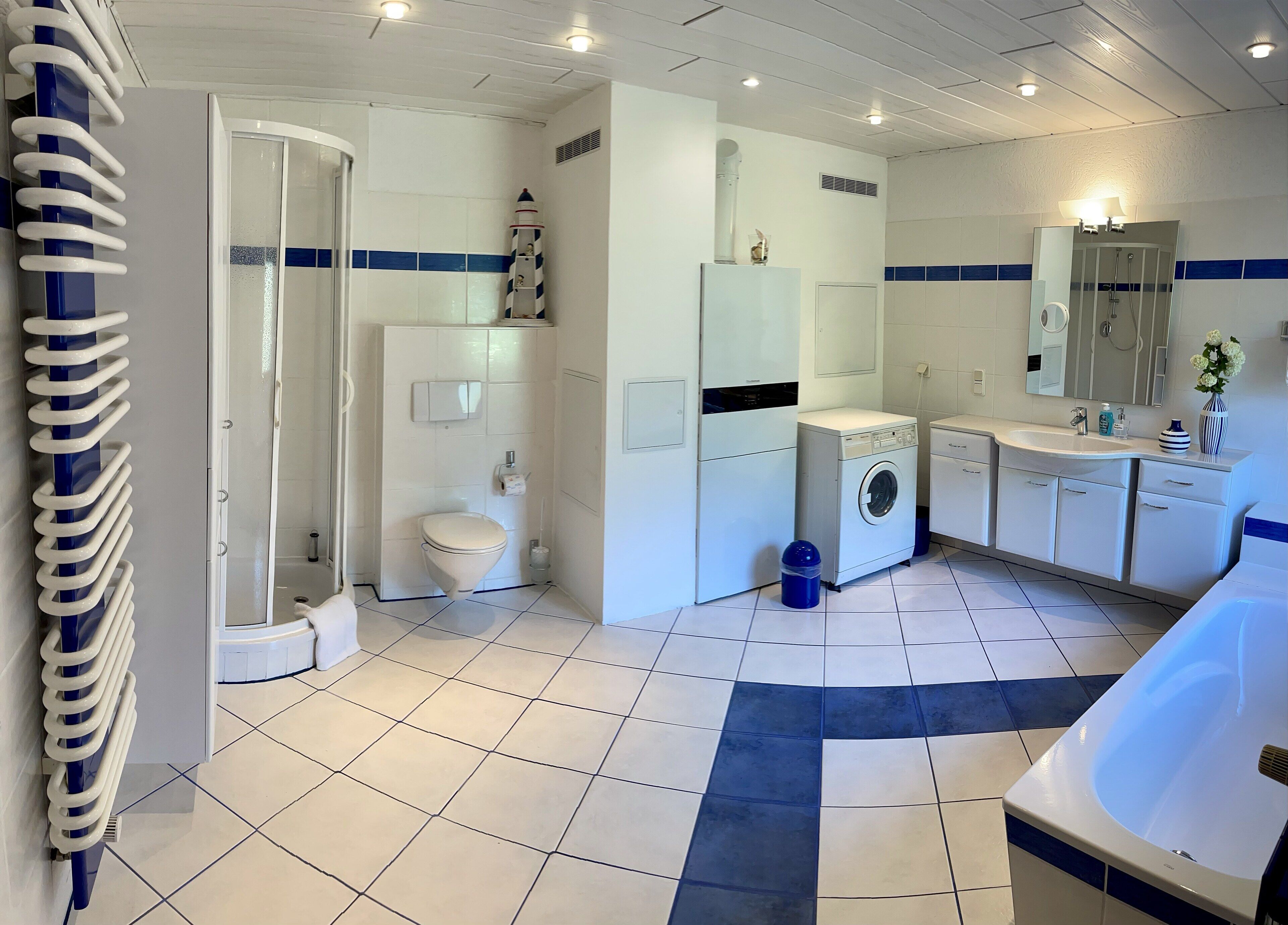 Combined shower/tub, hair dryer, towels, soap