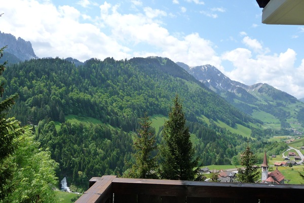 Panoramic view from the balcony: Valley + village + waterfall