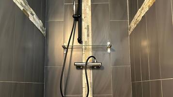 Shower, towels, toilet paper