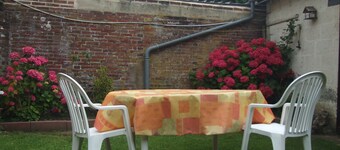 Small Half-timbered norman house in village with all convenience store