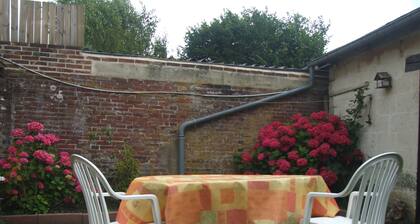 Small Half-timbered norman house in village with all convenience store