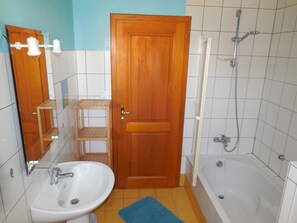 Combined shower/tub, hair dryer