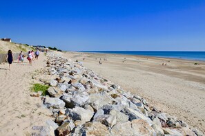 On the beach, sun-loungers