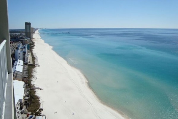 Eastward balcony view of coast line and gulf from this gorgeous Penthouse