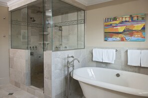 Bathtub, hair dryer, towels, soap