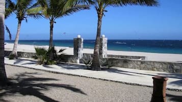 On the beach, sun loungers, beach towels