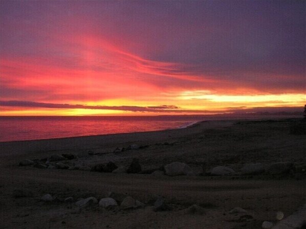A beach with a sunset. - Casa de Las Palmas . . . like your own beachfront estate on the Sea of Cortez! (Los Barriles)