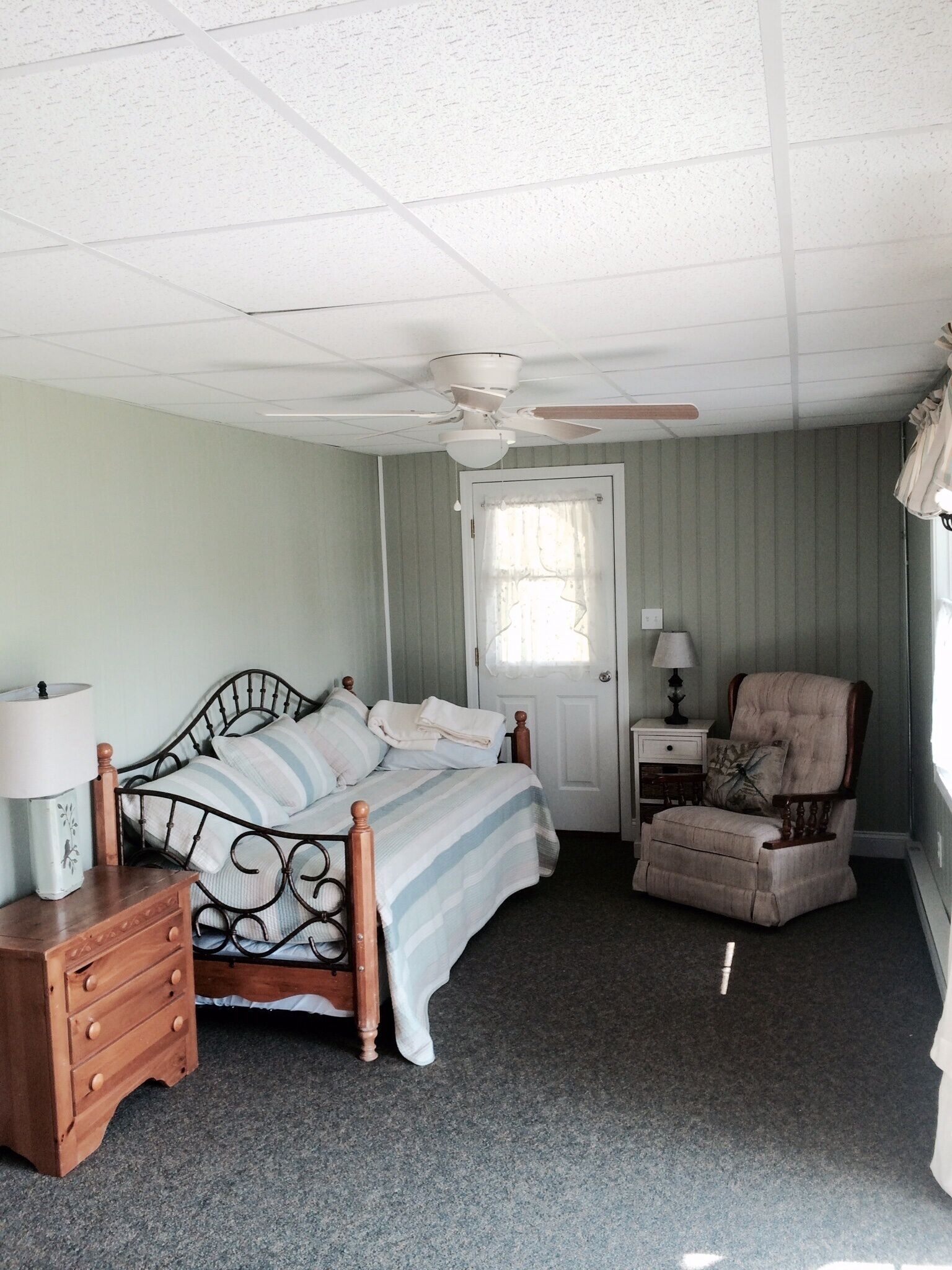 Large Lakefront Reunion And Retreat Home With a large lawn and wrap around porch