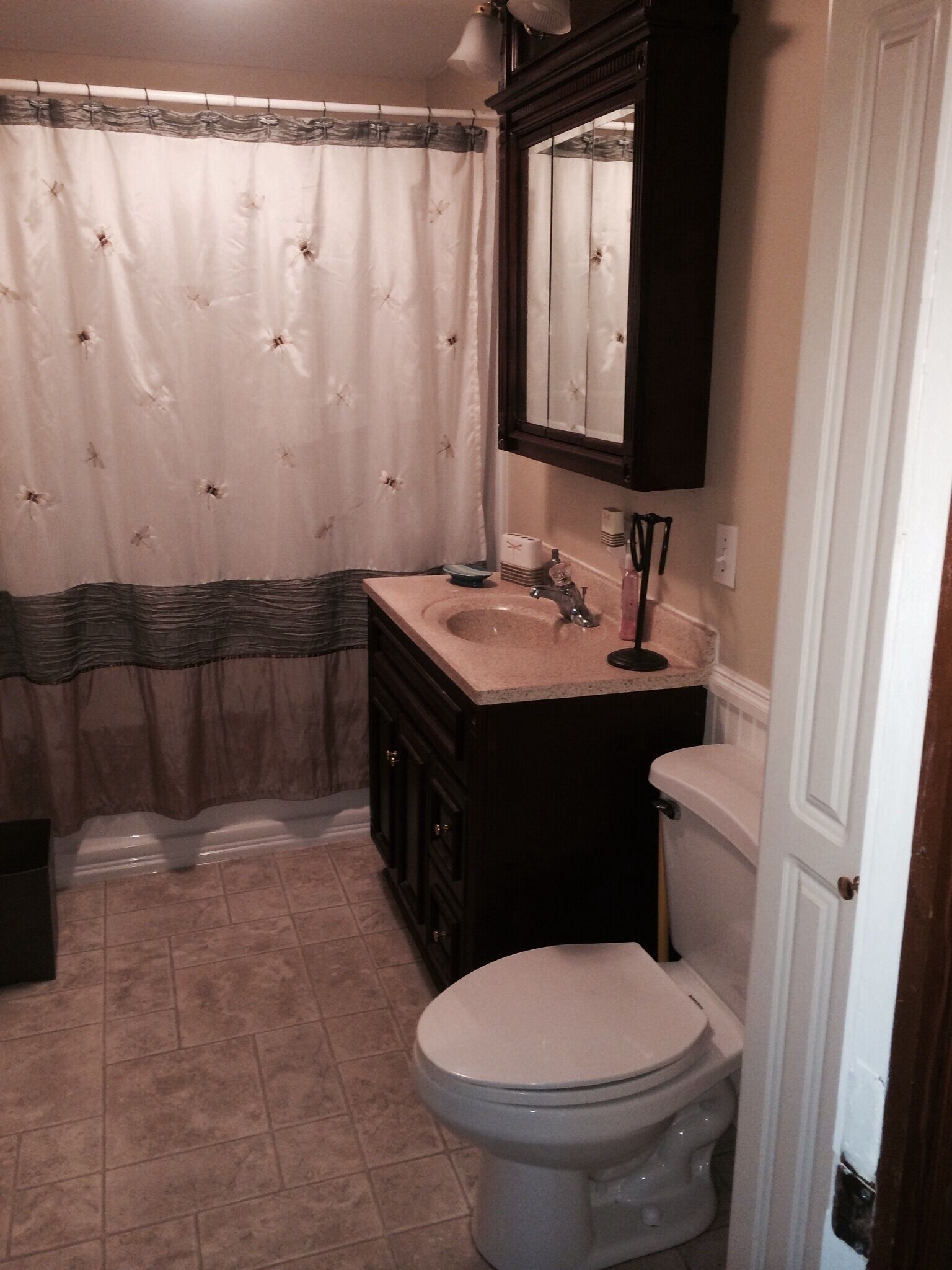 Large Lakefront Reunion And Retreat Home With a large lawn and wrap around porch