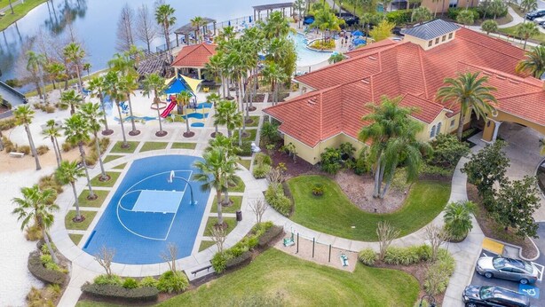 An aerial view of a resort with a basketball court, swimming pool, and palm trees. - 7 BDRM, Private Pool/HotTub, Heat Included, Games (Kissimmee)