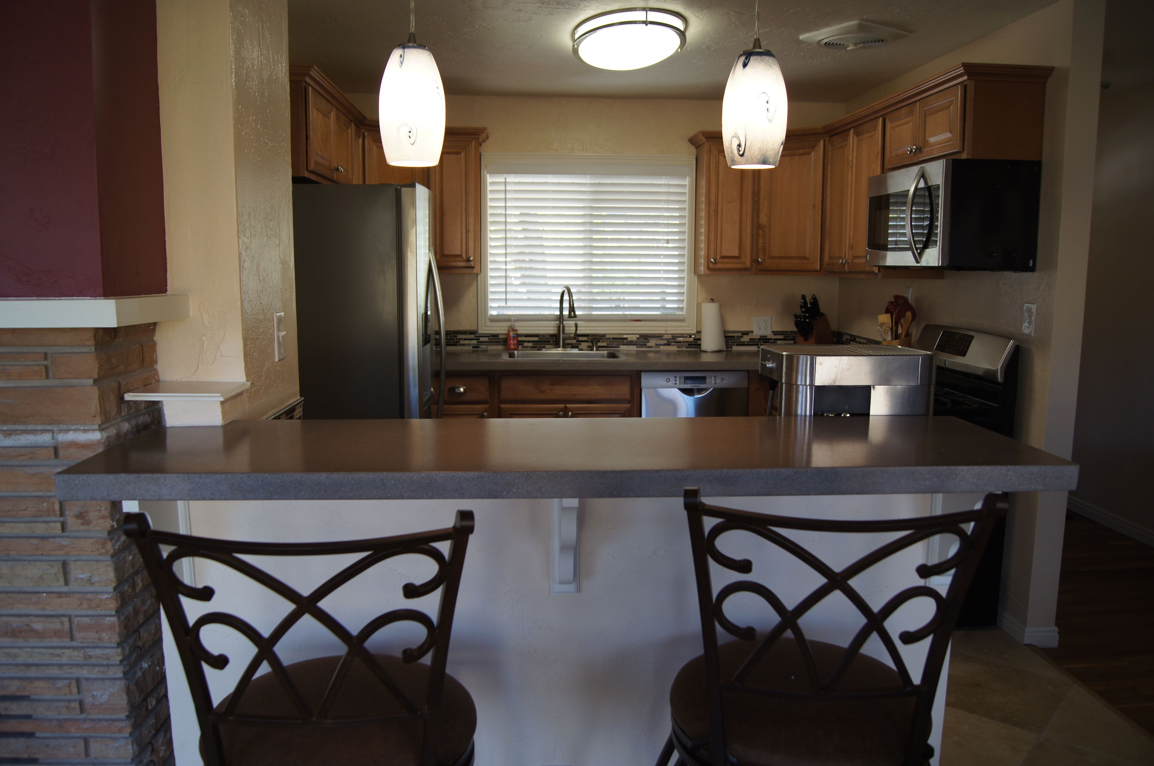 Remodeled in-town beauty with Mountain Views! Large, fully fenced back yard.