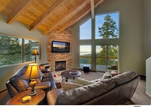 2nd Floor Den: Gas fireplace, rock hearth, mind-numbing 
views of Lake Tahoe and