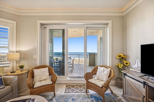 Oceanfront Condo Steps from Ritz | Resort Pools | Sweeping Views