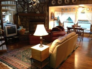 Smart TV, fireplace, DVD player, books