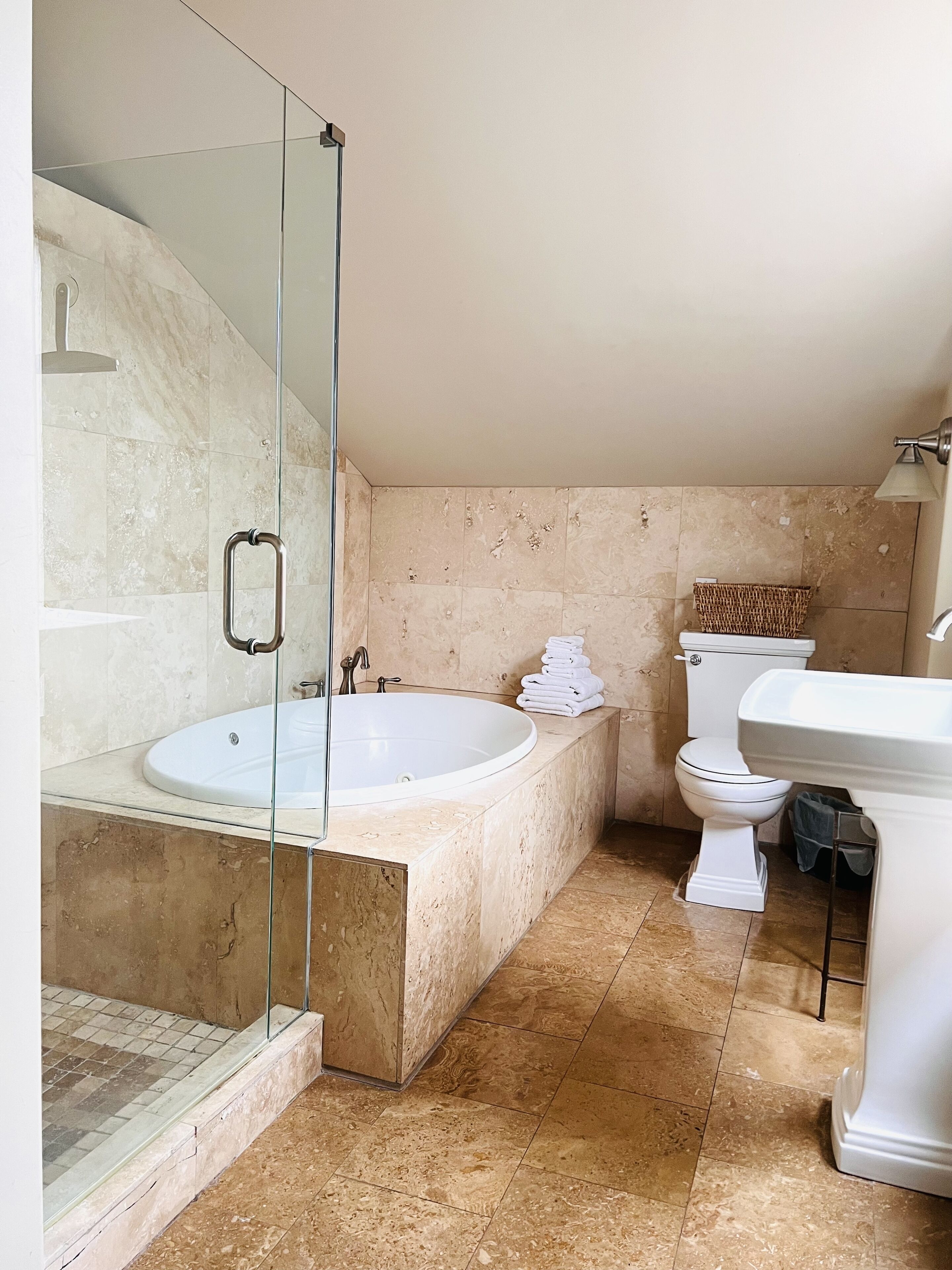 Bathtub, jetted tub, hair dryer, towels