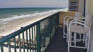 A balcony with a view of the beach and ocean. - Sunglow, Beachfront Deluxe - 2 bed, 2 bath - ocean front unit (Daytona Beach Shores)