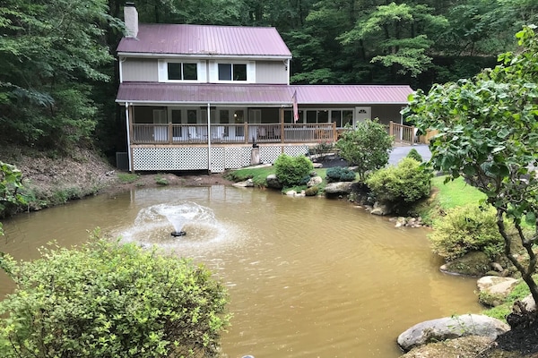 Seclusion, privacy, private fish pond, located on 4 acres in a gated community!