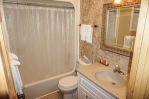 Combined shower/bathtub, hair dryer, towels, soap