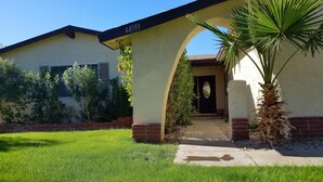 A single-story house with a number 44593 on the front. - Make Your Friends Jealous (Indio)