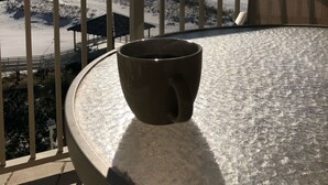 A balcony with a view of the beach and ocean. - Gulf View, Steps from the Beach, Family Friendly (Destin)