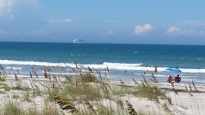 On the beach, sun-loungers, beach towels