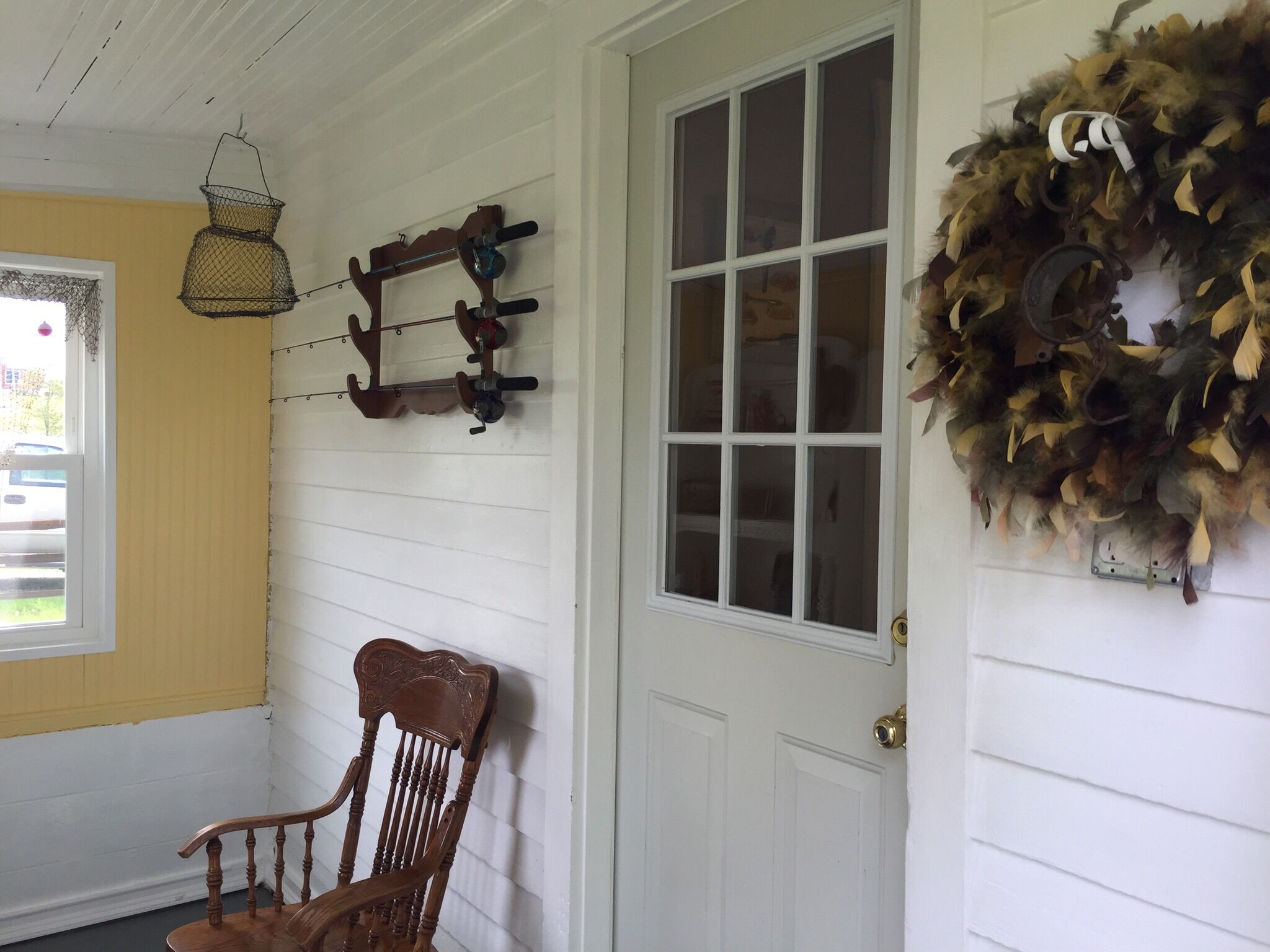Back Porch ~ fishing poles are waiting. 
