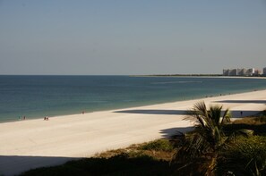 On the beach, sun-loungers, beach towels