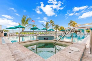Outdoor pool, a heated pool - Lazy Tortuga ground level 2bed/2bath half duplex with dockage & cabana club (Key Colony)