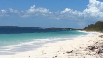 On the beach, sun-loungers, beach towels