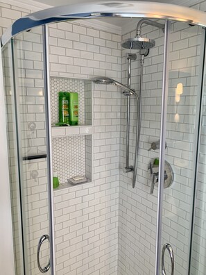 Bathtub, hair dryer, towels, soap