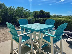 Outdoor dining - Escape to Westview Gardens, 3 bedroom home with private pool & sunset views. (Long Bay Hills)