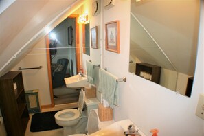 Combined shower/bathtub, soap, toilet paper
