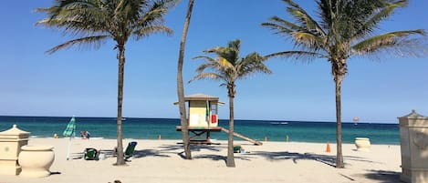 On the beach, sun-loungers, beach towels
