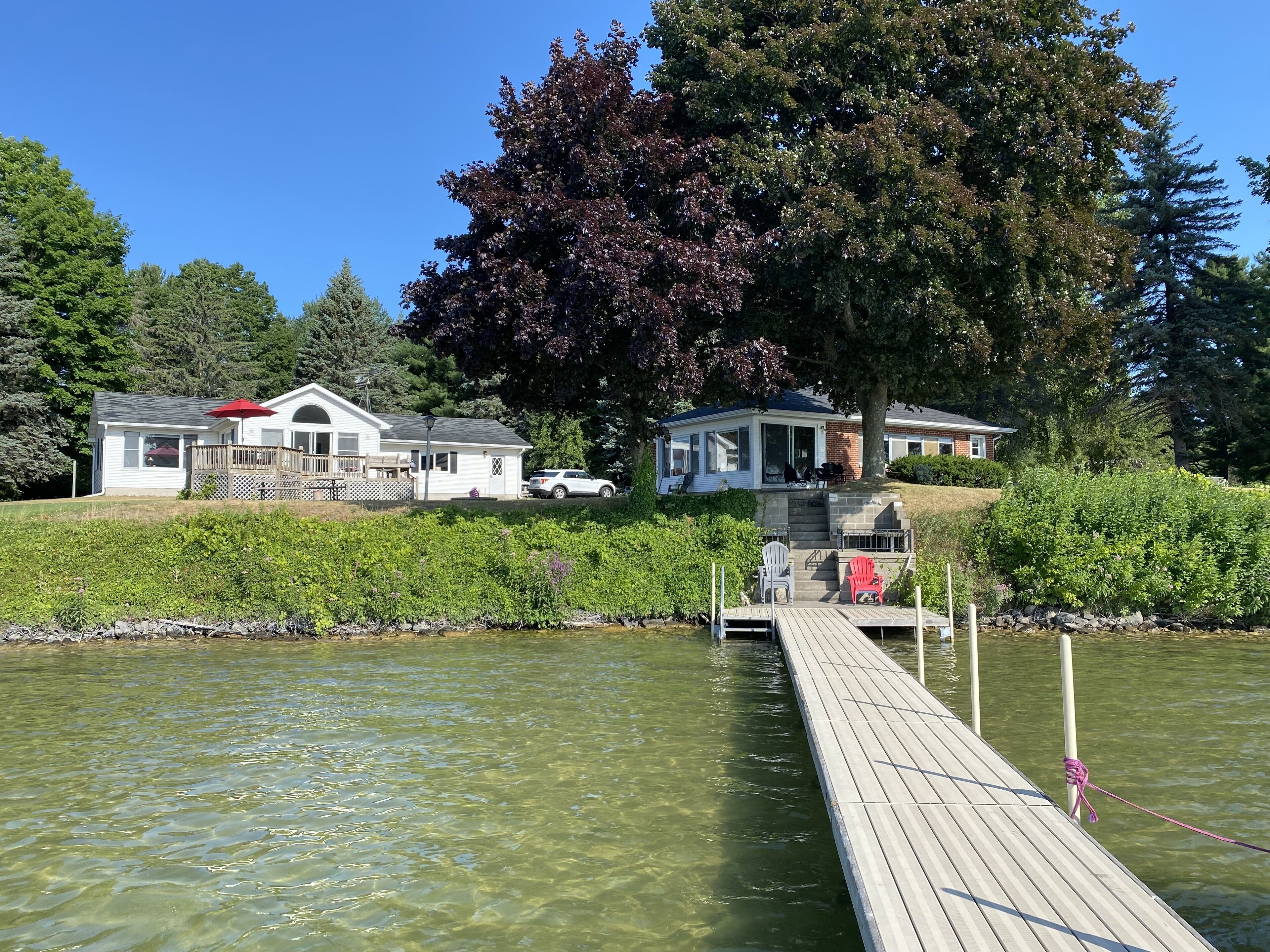 200 feet of pristine lake frontage & two cottages - One rental fee