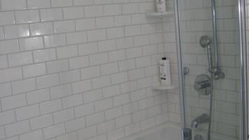 Combined shower/tub, hair dryer, towels, soap