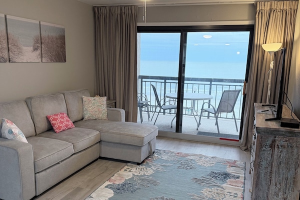 Living Room with reviews of the ocean.