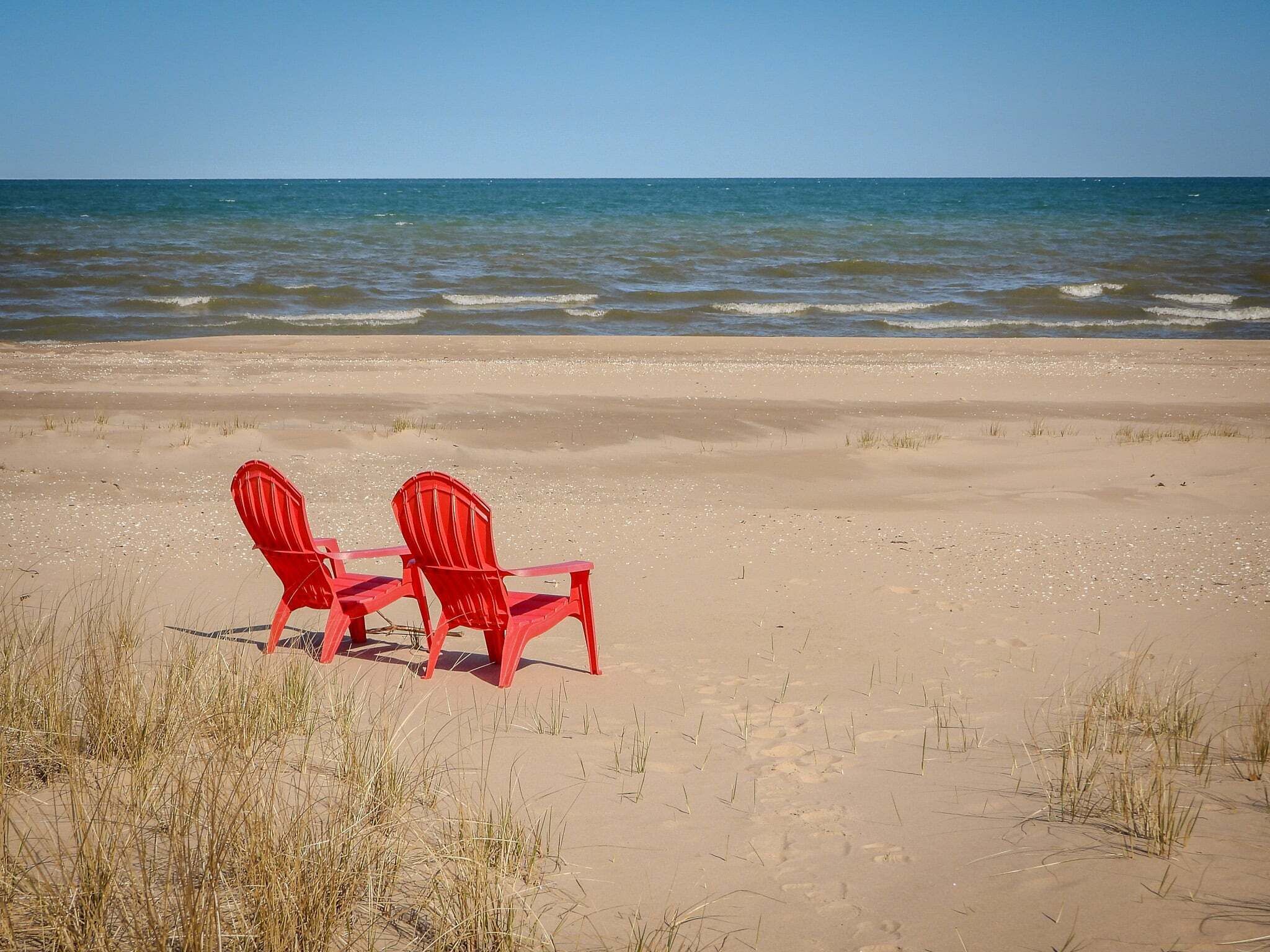 On the beach, sun-loungers, beach towels