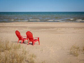 On the beach, sun-loungers, beach towels