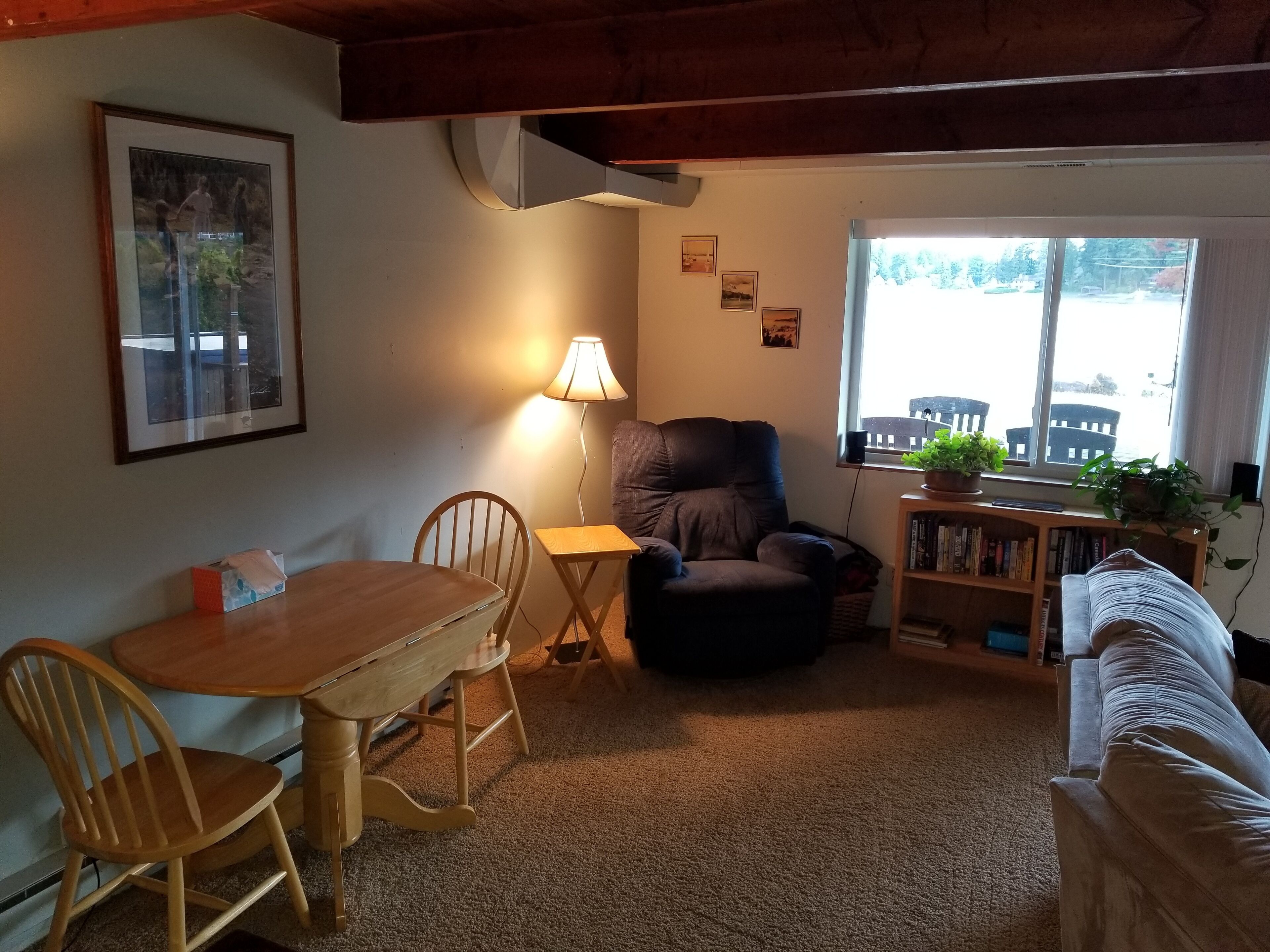 lower-level eating area with view to Bay