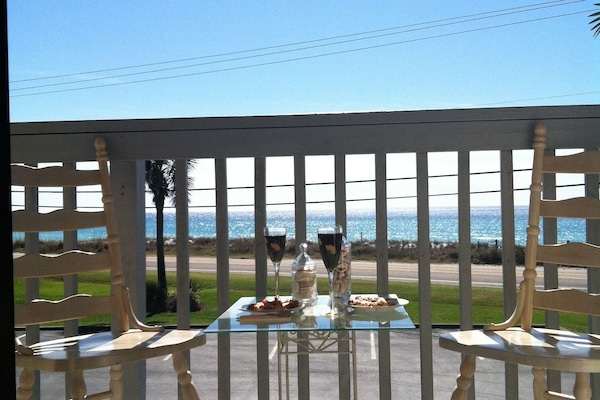 Enjoy breakfast on the balcony overlooking the beautiful beach